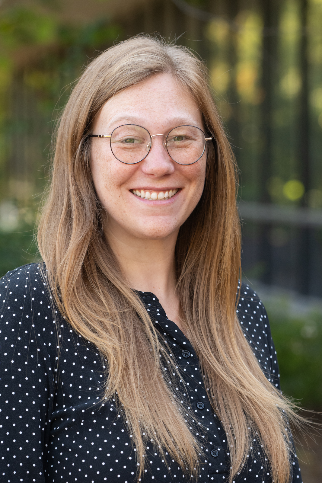 A portrait photo of Corinne O'Bryan  (She/Her)