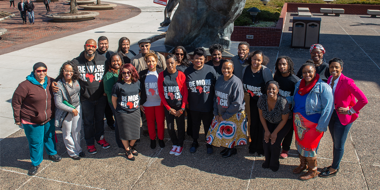 Black Faculty & Staff Association on the SIUE campus in front of the Cougar Statue 