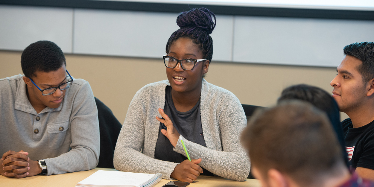 Students working at a table.