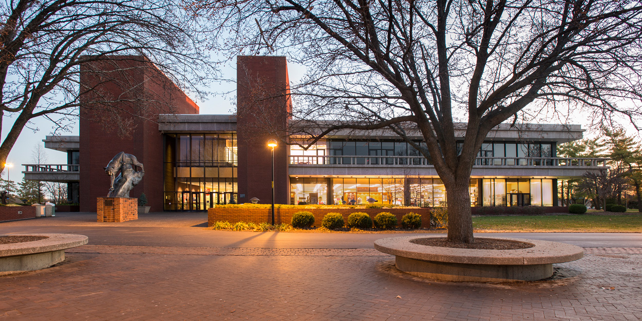 Front view of the cougar statue at the SIUE Morris University Center during dusk. 