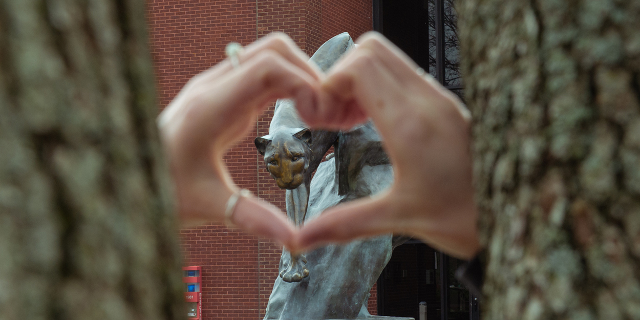 Heart Hand in front of the SIUE Cougar Statue.