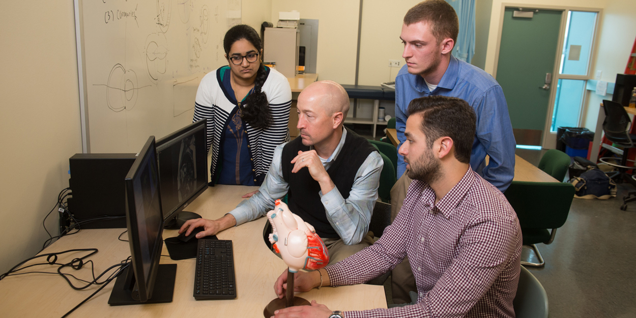 Professor at SIUE working in a lab.