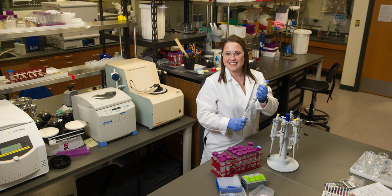 Professor at SIUE working in a lab.