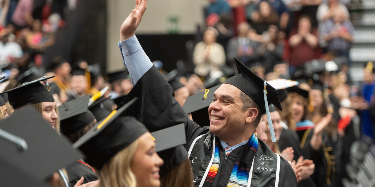 SIUE student graduating