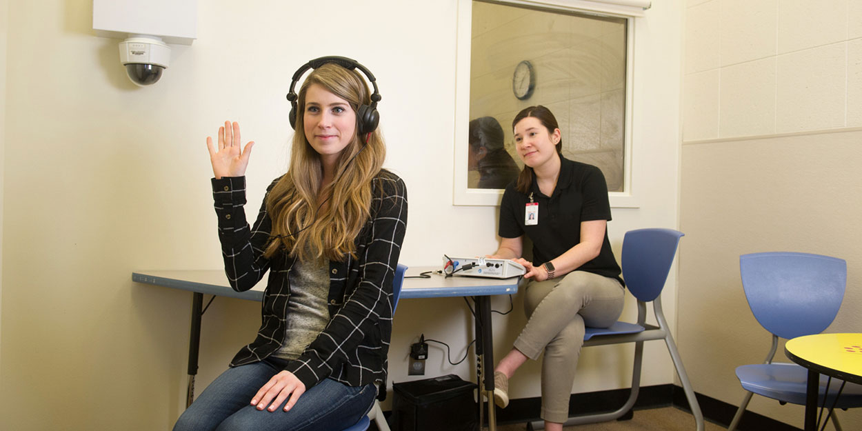 SIUE Student doing a hearing test 