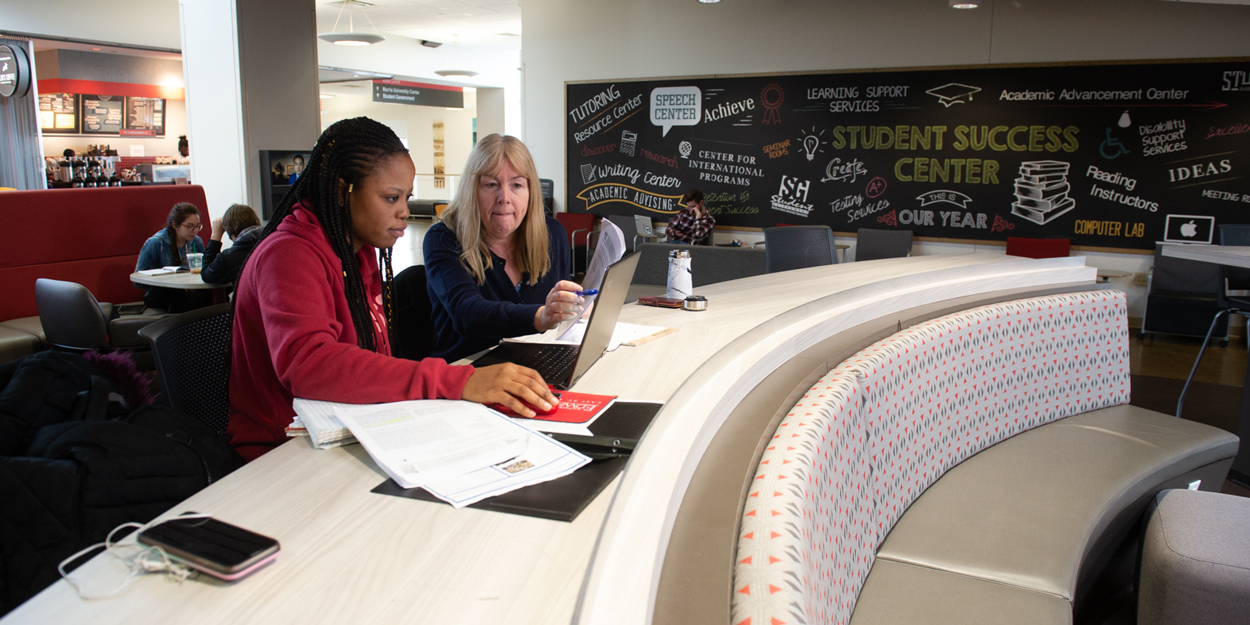 Two professors in the SIUE Student Success Center.