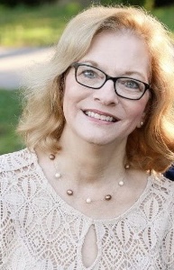 A portrait photo of Claire Miles