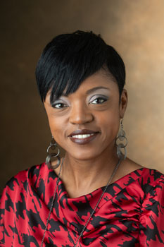 A portrait photo of Alicia Fisher