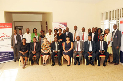 SIUE's Kathy Brady, PhD, and Michelle Cathorall, DrPH, sit alongside dignitaries of Ndejje University.