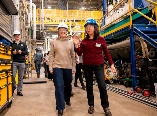 Congresswoman Budzinski and Dr Yan take walking tour through fermentation plant