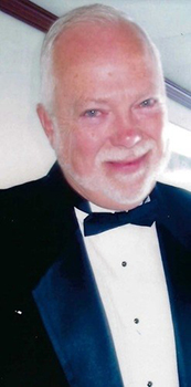 portrait of Henderson in a tuxedo