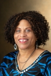 A portrait photo of Diane Owino, PhD