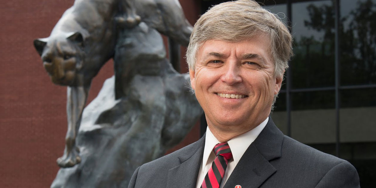 Chancellor Randy Pembrook greets students during commencement exercises.